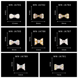 Hot sale charming gold alloy nail art design 3d nail art rhinestones bow tie jewelry JA781