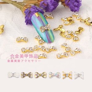 Hot sale charming gold alloy nail art design 3d nail art rhinestones bow tie jewelry JA781